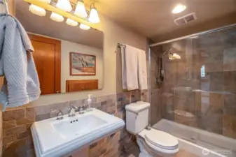 Main floor full bathroom with beautiful slate tile