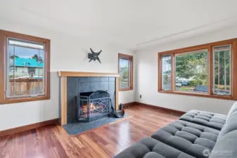 Spacious, light filled Living Room with cozy fireplace.