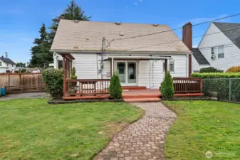 Spacious yard perfect for recreation, gardening and gathering.