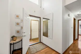 Entryway is a created vestibule, separating the entrances to the main living and studio unit