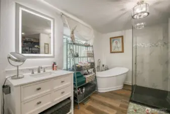 completely updated and modern bathroom with huge walk in shower and deep soaking tub