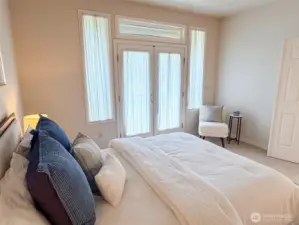 Primary bedroom opens onto the deck