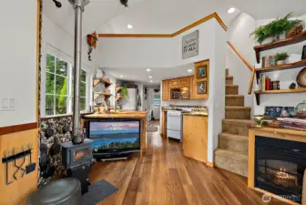 Open layout connects the living room and kitchen, creating a functional and efficient living space.