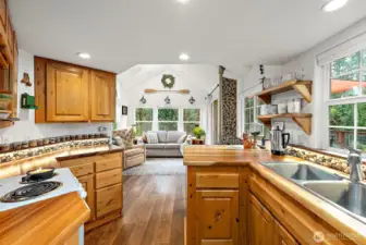 Kitchen flows seamlessly into the living area, maximizing space and functionality.