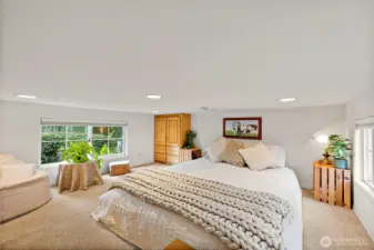 Serene upstairs loft provides a quiet, comfortable retreat ideal for rest and relaxation.