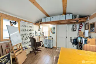 Efficient studio layout offering open workspace and generous storage.