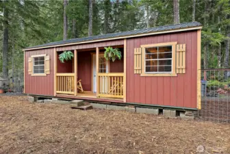 Unfinished bunkhouse offering additional flexible space.