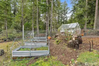 Raised garden beds offer an ideal setup for growing flowers, herbs, or vegetables.