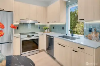 High-end stainless steel appliances and plenty of cabinet storage space.