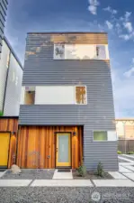 4409B is a three-level home with the primary suite on the top floor, the middle level hosts the open living & kitchen area, and the entry level has a large foyer with a coat closet, and a spacious guest suite with an adjacent full-tiled bathroom. Modern clean lines, abundant natural light, and mindful design.