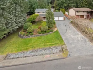 Extra long driveway gives ample parking.