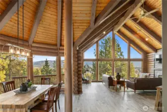 Experience breathtaking views from the timbered interior of this gorgeous log home. combined with breathtaking views.