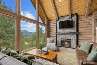 Soaring ceilings and expansive windows frame the stunning views.
