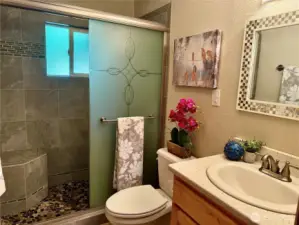 Updated bathroom w/ beautiful ceramic tile.