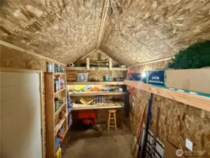 Tons of storage in outbuilding.