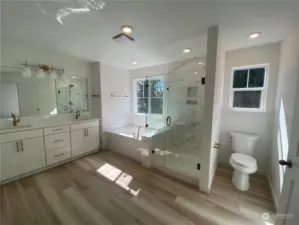 Luxurious 5-Piece Primary Bathroom with Glass, Tile Shower