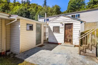 Backyard shed powered with 220V electricity. This is where you washer and dryer will be located. There is a plumbing and sink also.