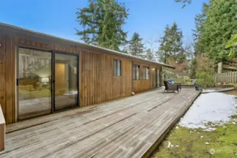 Back deck with access to both the primary suite and dining room.