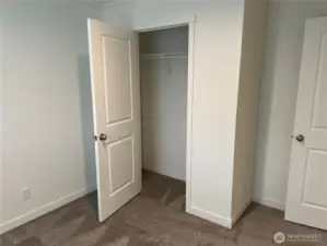 Second bedroom closet area.