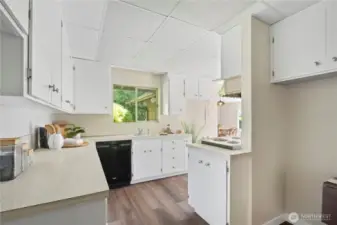 A spacious layout ready for your vision—update with ease while honoring the home’s mid-century soul.
