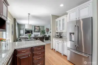 Amazing Kitchen!  Custom Cabinets & Granite Counters + Commercial Jenn Air Gas Oven & Cook Top w/ Commercial Vent Hood.  Refrigerator also Jenn Air.  All APPLIACNES Convey!