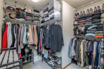 Primary Bedroom has Vaulted Ceilings, nice window for letting in the daylight, a huge walk in closet, 5 piece bath + large vanity.