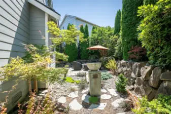 Extensive Landscaping in Front, Back & Side Yard.  This owner might as well been a Accredited Landscape & Design Professional.