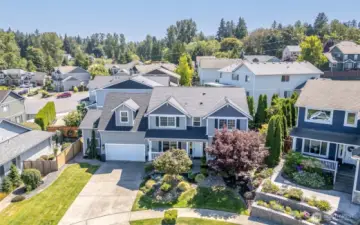 This home sits at the end of the Cul De Sac.  Very little traffic.  Plenty of off street parking in this deep driveway.  +++ the 3 car garage is deeper than traditional garages & it has super high ceilings.  Tons of storage ability.  Or make a workout room in the 3rd bay of the garage.  Plenty of power for TVs, Audio, Sauna, or whatever you like in the enormous garage.  It is also wired for an electric car charger (just the expensive part ... the panel to junction in the wall. No outlet currently installed).