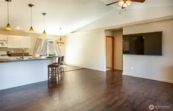 The great room is truly great! It a very wise use of space with cathedral ceilings overhead.