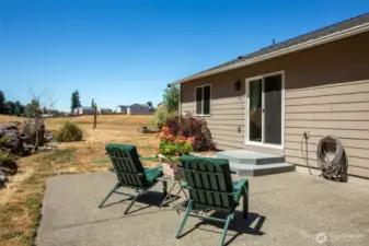 Outside again on the large aggregate patio.  Where's the BBQ grill?