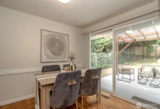 Dining area with 96" sliding door to the backyard