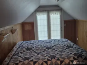 Upstairs bedroom with king size bed