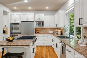 Brand new refrigerator, contemporary sink and fixtures. Handles from restoration hardware add sophistication and a luxe feel!