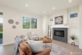 Cozy up to the electric fireplace in the winter.