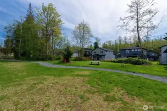A view of the back of the home from the neighborhood park, directly behind the home.