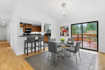 Dining room w/ bar stools Virtually staged. Furniture and décor shown are for illustrative purposes only.