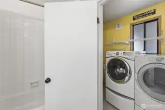 Lower-level full bathroom and laundry room w/d stays with the buyer.