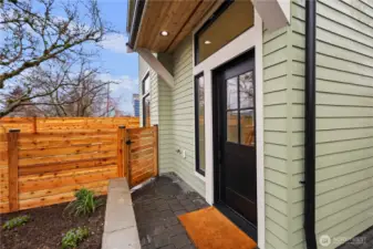 Main entry with gated access to front courtyard