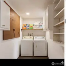 Image is virtually staged.  Actual W/D are in the garage and need to be re-installed.