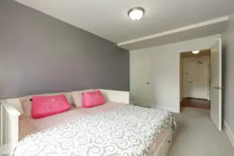 Bedroom with ample closet space