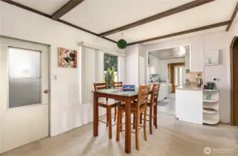 Informal dining area is conveniently located off the kitchen.