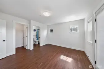 Lower level junior suite with ensuite bath and walk-in closet.