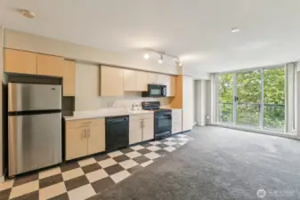 Discover your peaceful escape in the city—an urban retreat with a private, tree-lined view nestled in vibrant downtown Bellevue.