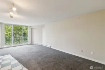 Enjoy peace and privacy with a wall of windows and charming Juliet balcony.