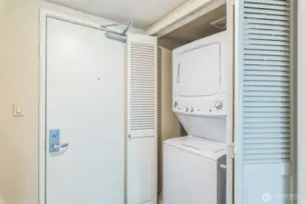 Conveniently situated near the elevator and refuse closet, this unit also includes a secure parking space and a dedicated storage room in the common garage, located just steps from the entry for added ease and accessibility.