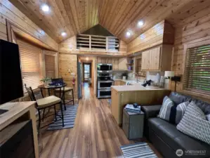 LIVING, BUILT IN CABINET WITH FIREPLACE, KITCHEN