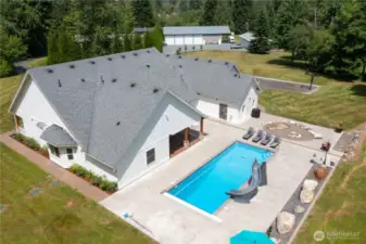 Enjoy the private backyard, in-ground pool and propane fire pit- just in time for summer!