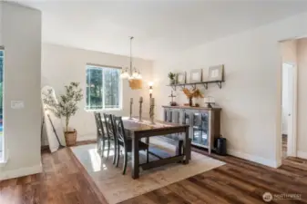 Dining space with room for a large table to seat multiple guests for that holiday party or get-together.