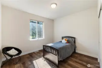 Guest Bedroom #1 at the front of the home.