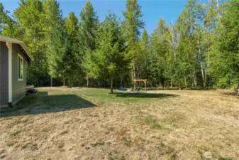 Another view of the fenced in yard